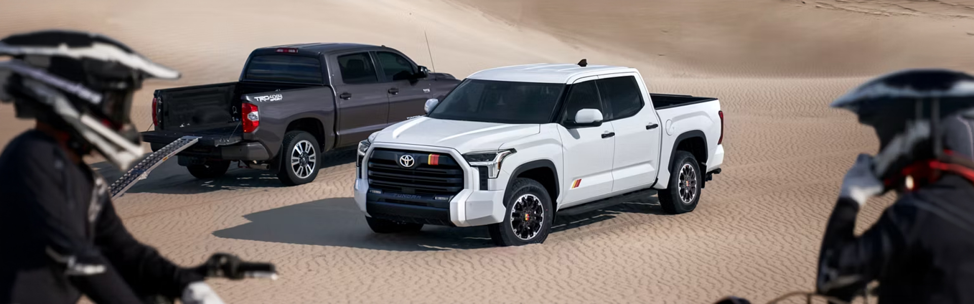 Toyota Trucks on desert dunes